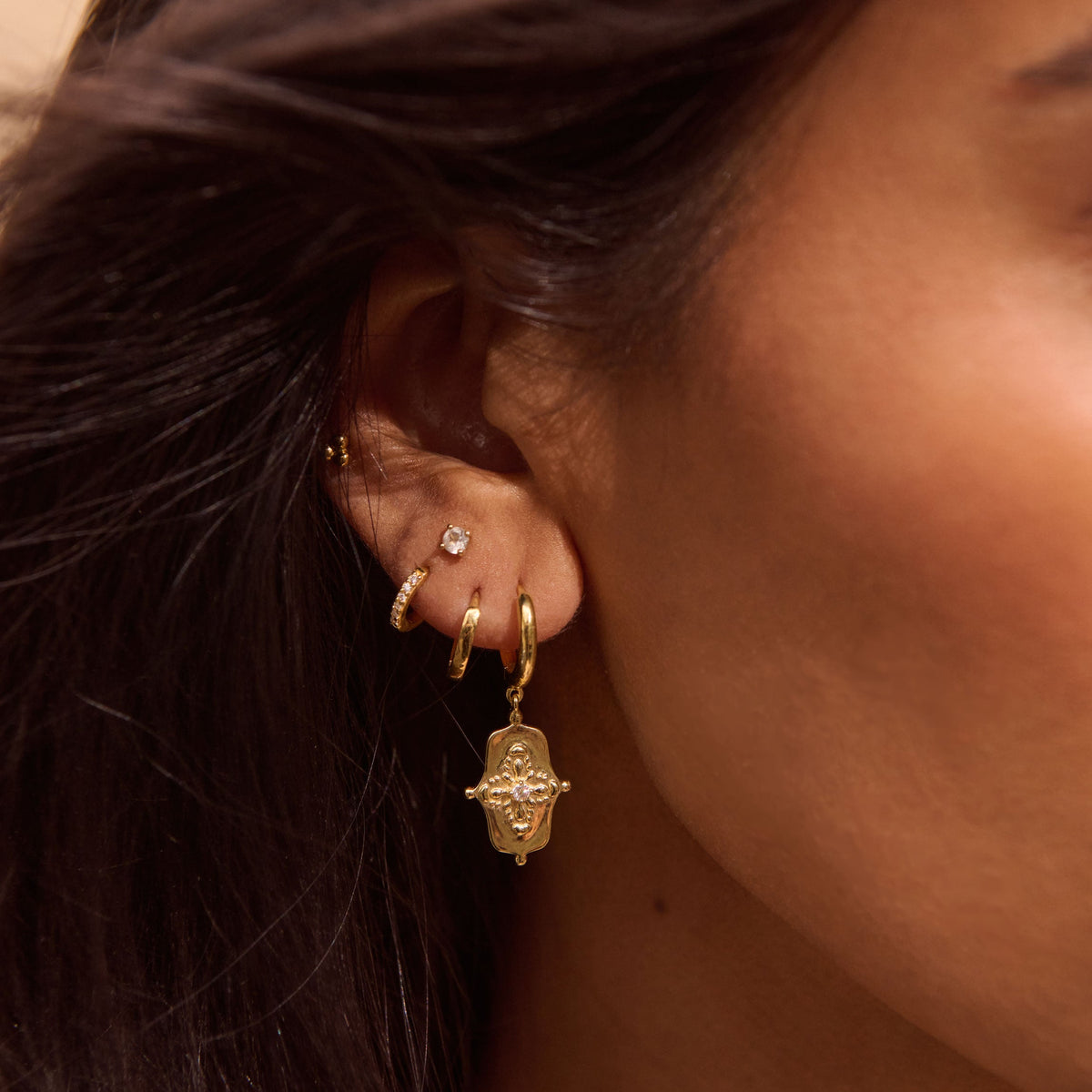 Murkani | Sahara Shield Huggie | 18KT Yellow Gold Plate